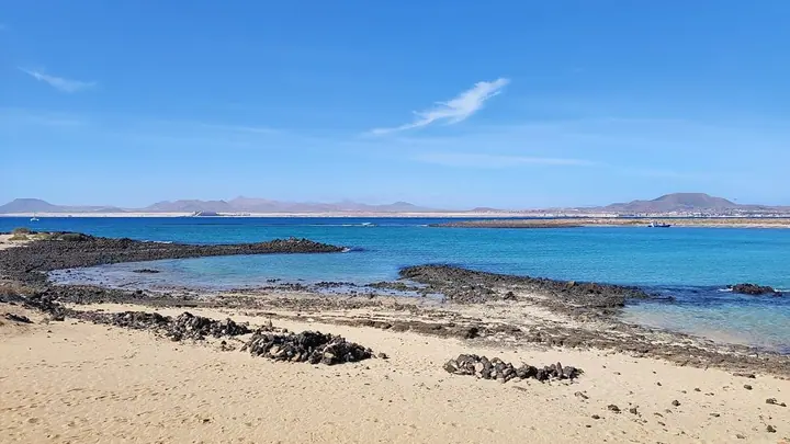 Clear turquoise water at Playa de la Concha on Isla de Lobos